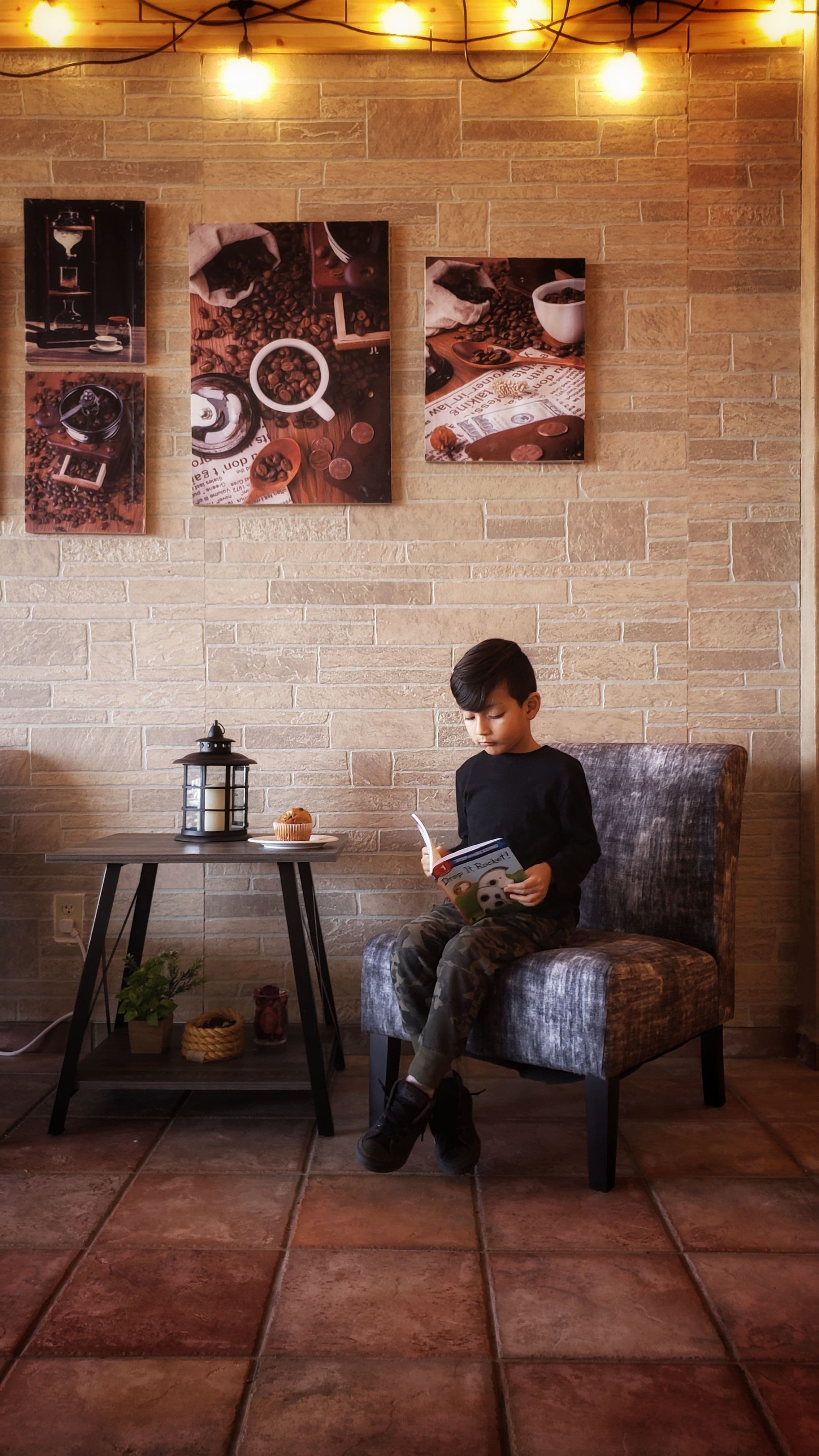 Woman seated and reading attentively