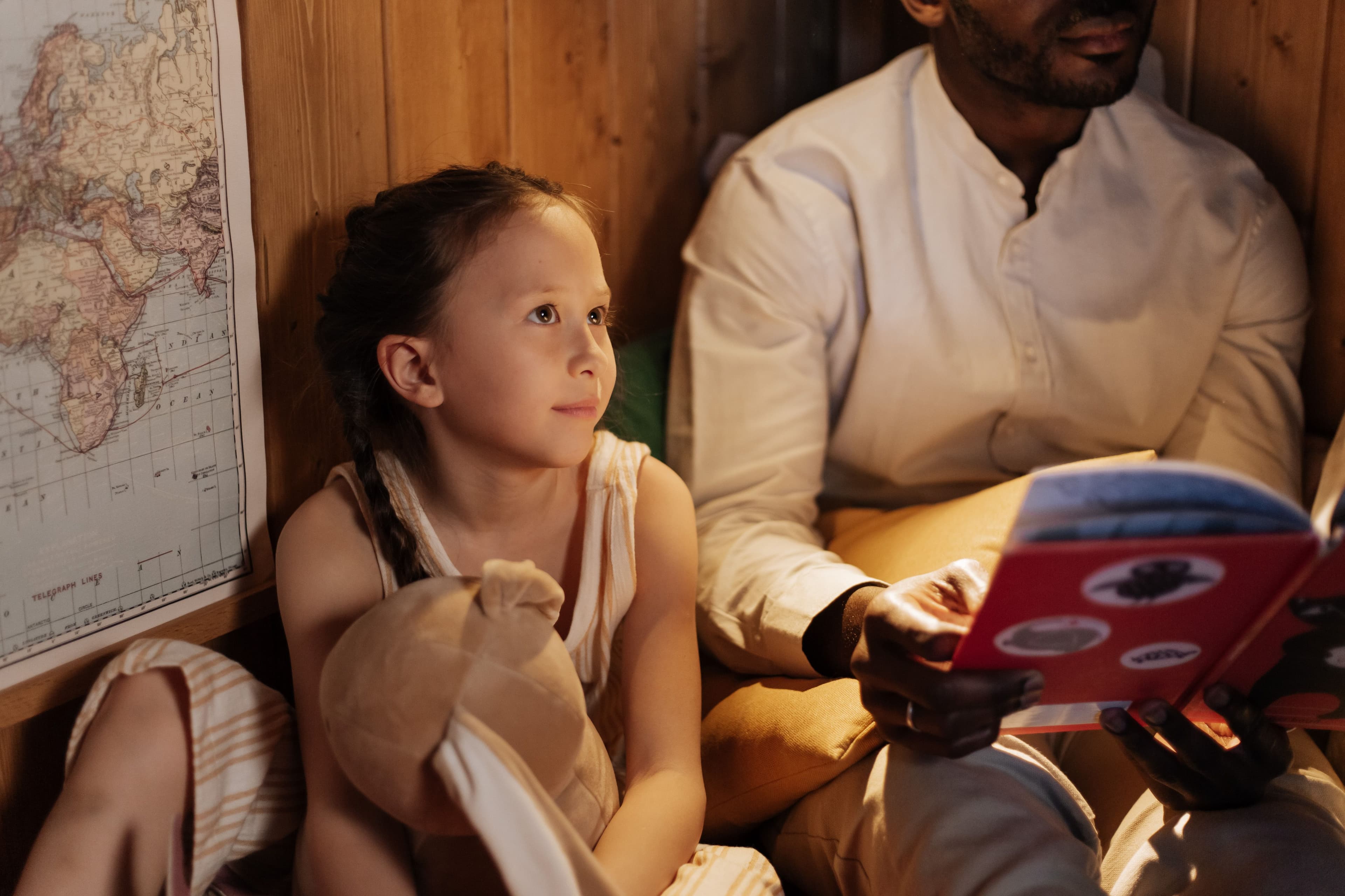 Child reading the Quran at home