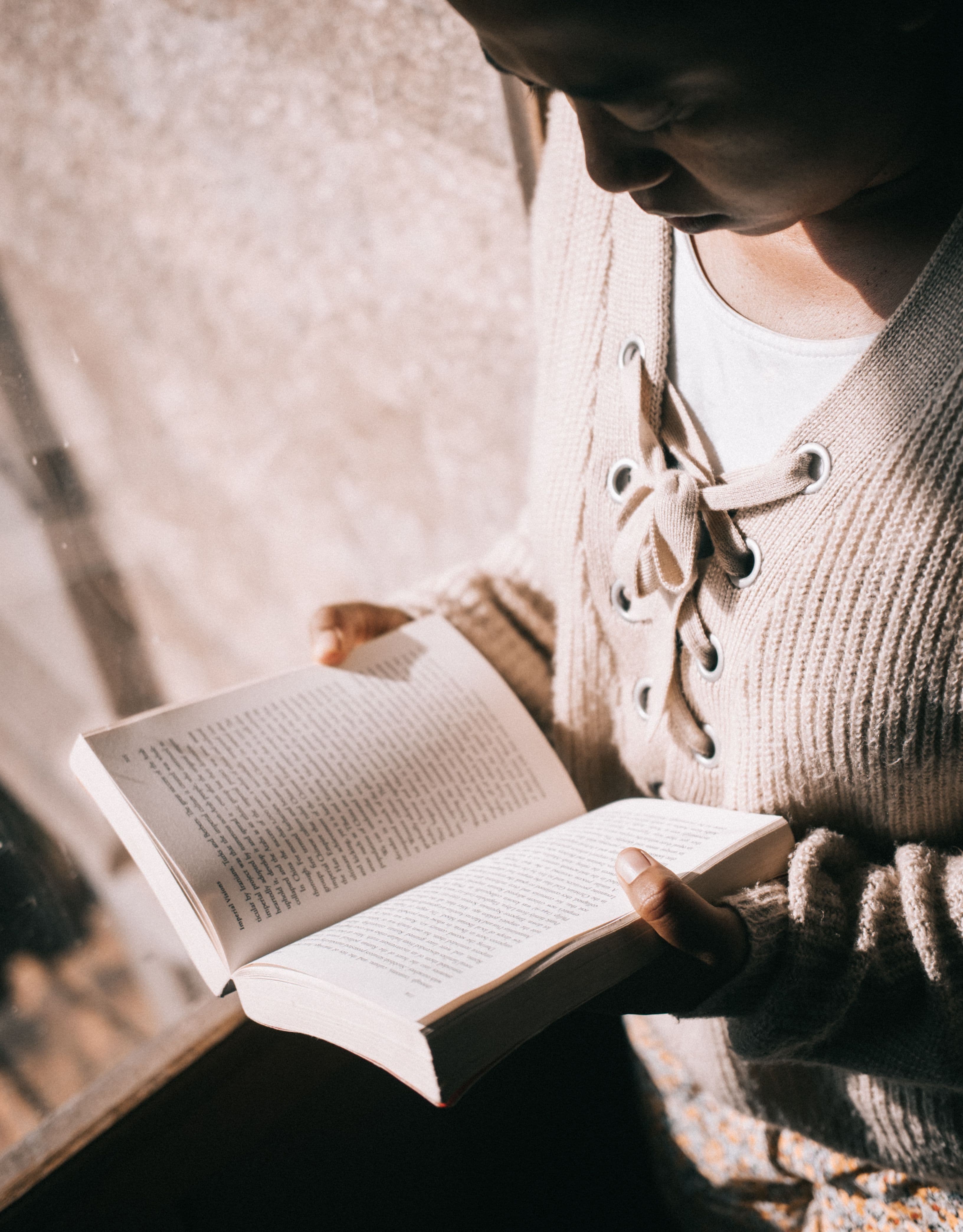 Woman teacher reading attentively