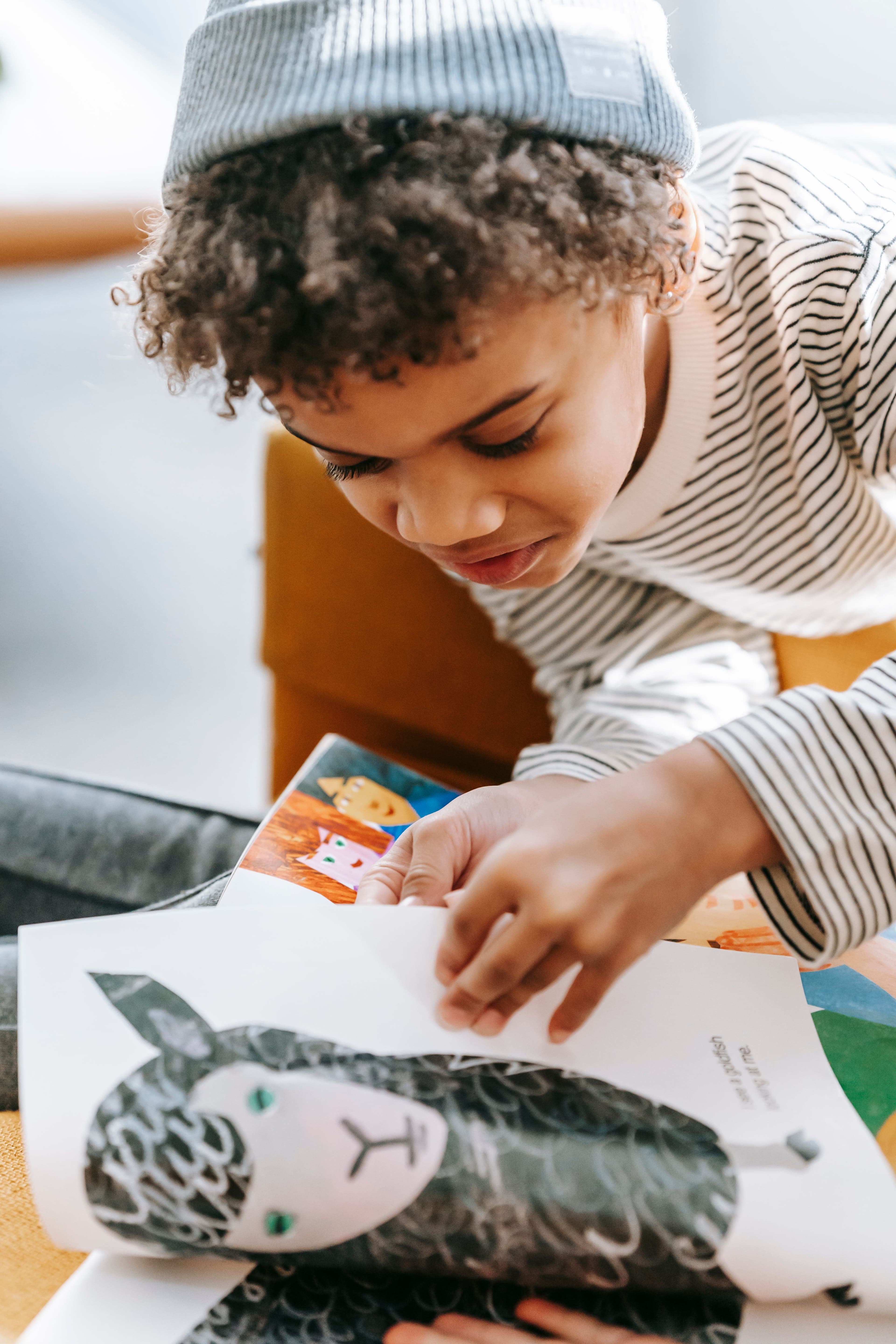 Child reading with focus