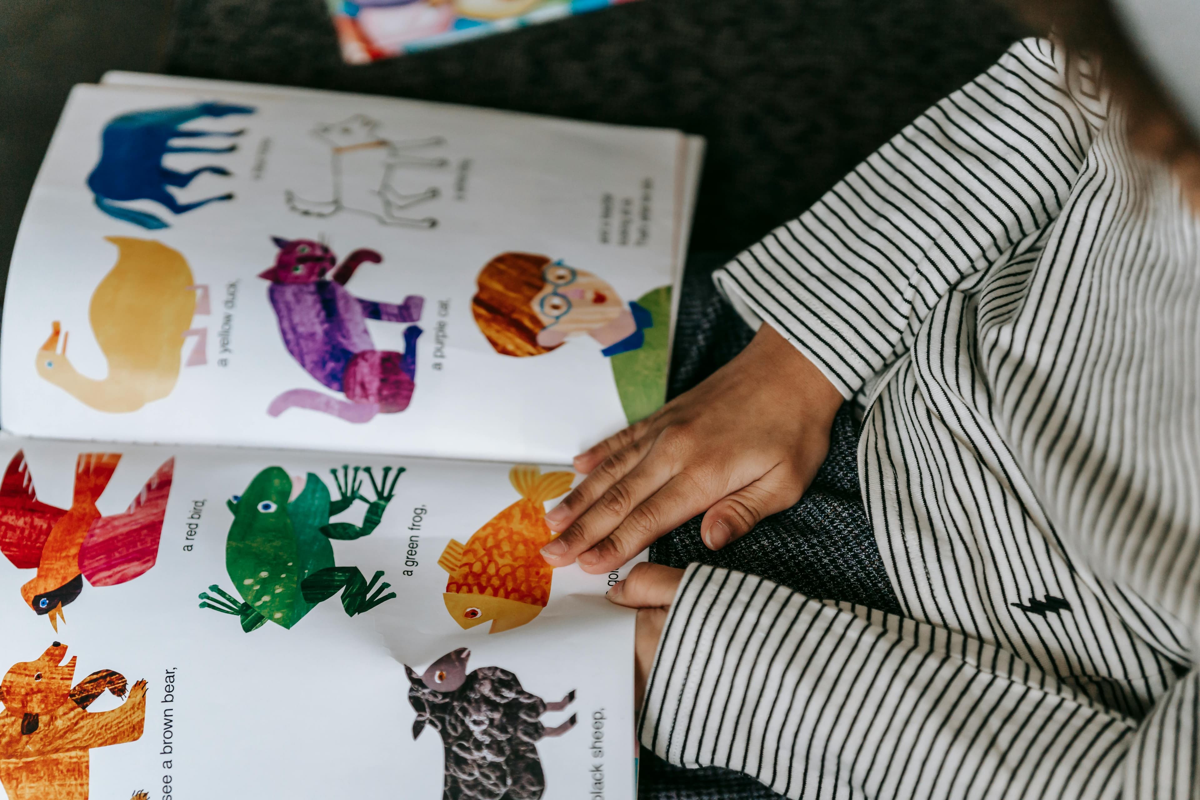 Child engaged in reading at home
